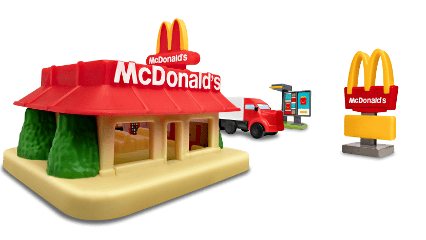 A little McDonald’s restaurant, delivery truck, drive thru and McDonald’s sign