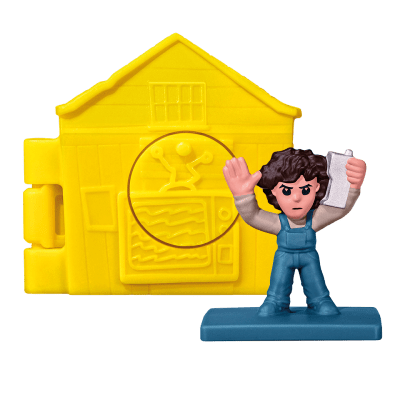 A yellow toy house with an Eleven toy inside