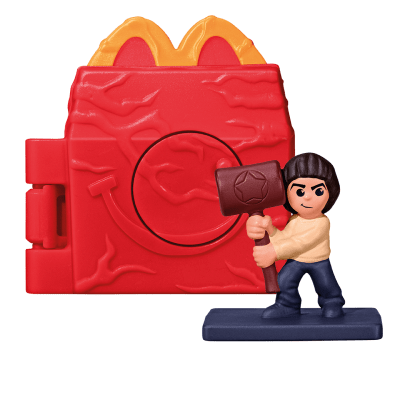 A red Happy Meal box-like toy house with a Will toy inside